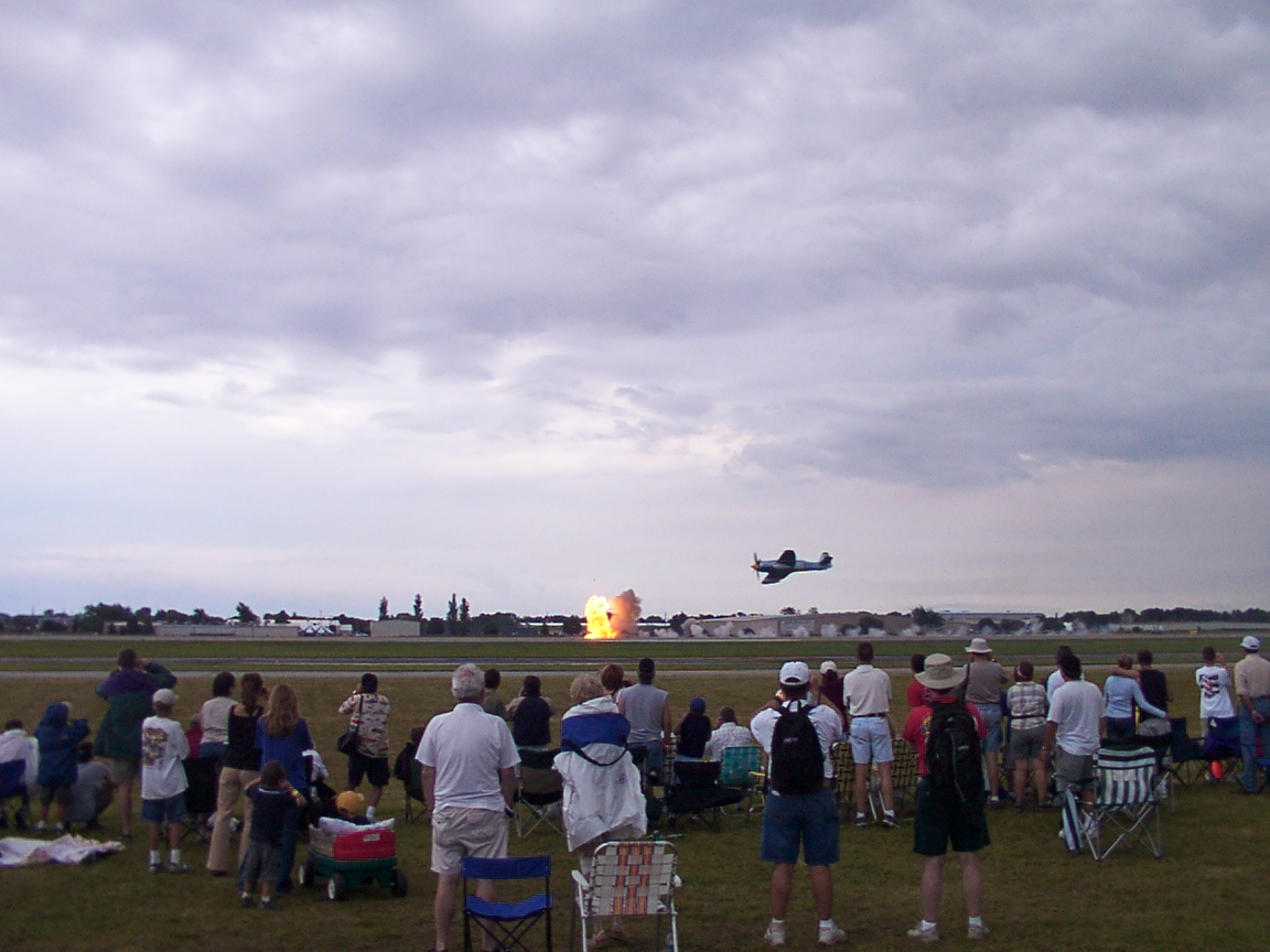 A simulated bombing run, with pyrotechnics between the runways.  