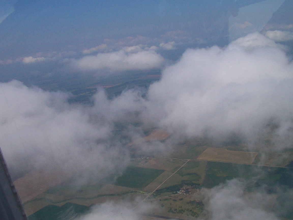 More clouds and scenery.  I especially enjoy this kind of flying.  