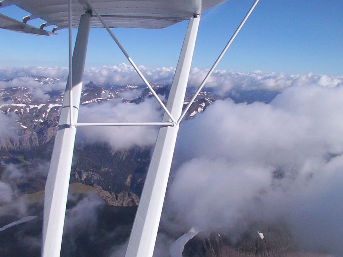 Decided not to go through, but go over the top. This is at 13,000 feet and can still climb at about 300 to 400 feet a minute at gross weight.This part of the flight was beautiful.  